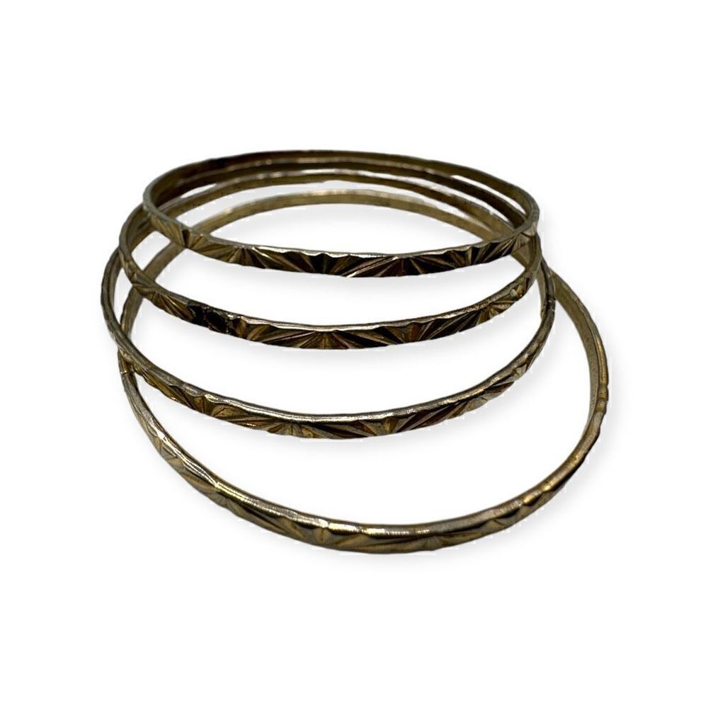 Set of 4 gold-toned bangle bracelets vintage costume jewelry